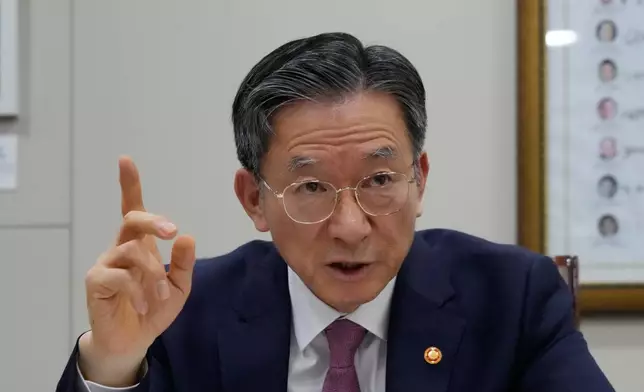 South Korean Justice Minister Jung Sung-ho speaks during a roundtable interview at the Justice Ministry in Gwacheon, South Korea, Thursday, April 9, 2026. (AP Photo/Ahn Young-joon)