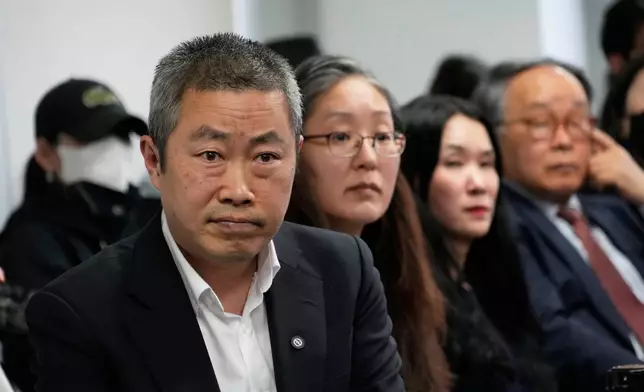 FILE - Peter Møller, left, Boonyoung Han, second from left, co-founders of the Danish Korea Rights Group, and adoptee Yooree Kim, second from right, attend a press conference at the Truth and Reconciliation Commission in Seoul, South Korea, March 26, 2025. (AP Photo/Ahn Young-joon, File)