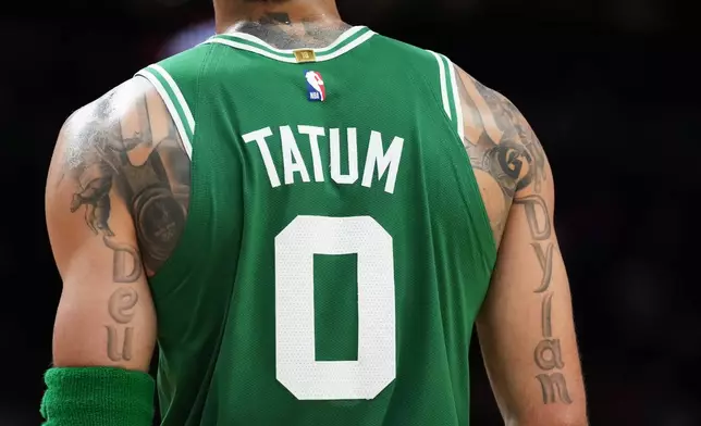 Boston Celtics forward Jayson Tatum (0) stands on the court during the second half of an NBA basketball game against the Miami Heat, Wednesday, April 1, 2026, in Miami. (AP Photo/Lynne Sladky)