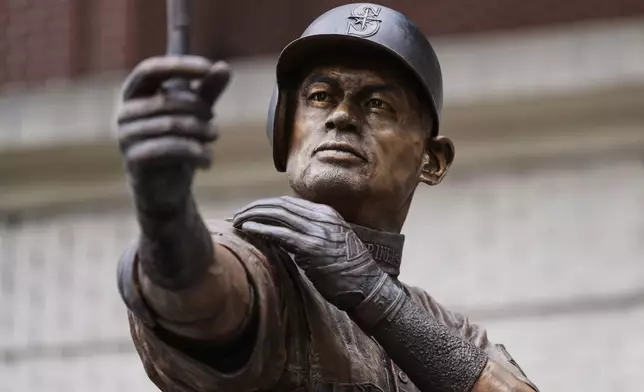 The statue of former Seattle Mariners right fielder Ichiro Suzuki is seen outside of T-Mobile Park, Friday, April 10, 2026, in Seattle. (AP Photo/Lindsey Wasson)