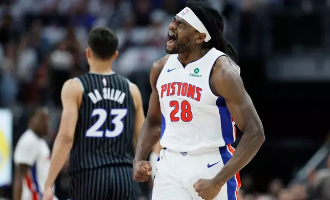 Detroit Pistons forward Isaiah Stewart (28) celebrates after forcing a turnover by the Orlando Magic during the first half in Game 2 of a first-round NBA basketball playoffs series Wednesday, April 22, 2026, in Detroit. (AP Photo/Duane Burleson)