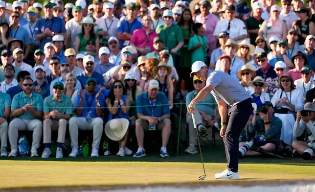 Rory McIlroy, of Northern Ireland, reacts after missing a putt on the 18th hole during the third round of the Masters golf tournament at the Augusta National Golf Club, Saturday, April 11, 2026, in Augusta, Ga. (AP Photo/Ashley Landis)