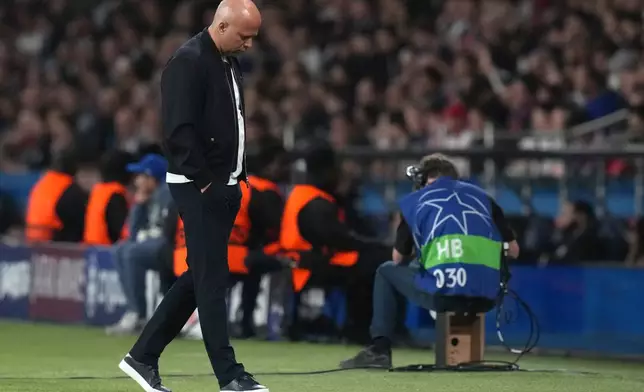 Liverpool's manager Arne Slot reacts during the Champions League quarterfinal first leg soccer match between Paris Saint-Germain and Liverpool in Paris, Wednesday, April 8, 2026. (AP Photo/Thibault Camus)