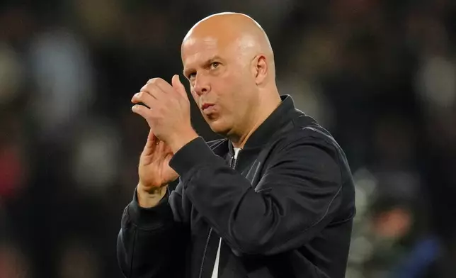 Liverpool's manager Arne Slot gestures after the Champions League quarterfinal first leg soccer match between Paris Saint-Germain and Liverpool in Paris, Wednesday, April 8, 2026. (AP Photo/Aurelien Morissard)