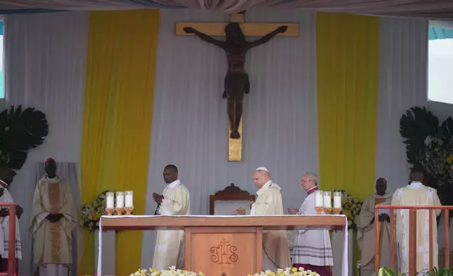 Pope Leo XIV celebrates Mass in the Japoma Stadium, in Douala, Cameroon, Friday, April 17, 2026 on the fifth day of his 11-day pastoral visit to Africa. (AP Photo/Andrew Medichini)