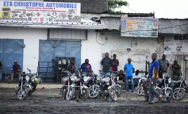 People wait for Pope Leo XIV in Douala, Cameroon, Friday, April 17, 2026 on the fifth day of his 11-day pastoral visit to Africa. (AP Photo/Andrew Medichini)