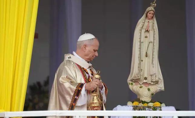 Pope Leo XIV celebrates a Mass at Bamenda Airport, Cameroon, Thursday, April 16, 2026, on the fourth day of his 11-day pastoral visit to Africa. (AP Photo/Andrew Medichini)