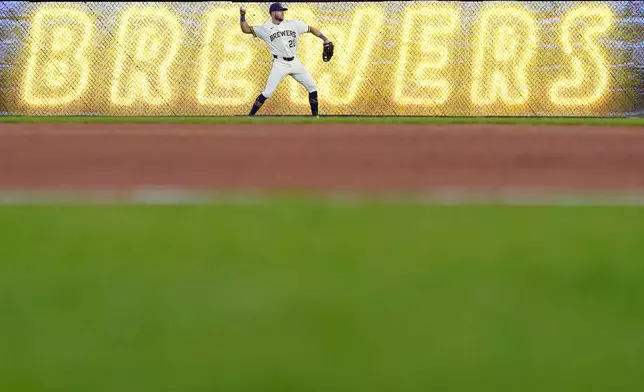 Milwaukee Brewers left fielder Brandon Lockridge warms up before the ninth inning of a baseball game against the Toronto Blue Jays, Thursday, April 16, 2026, in Milwaukee. (AP Photo/Kayla Wolf)