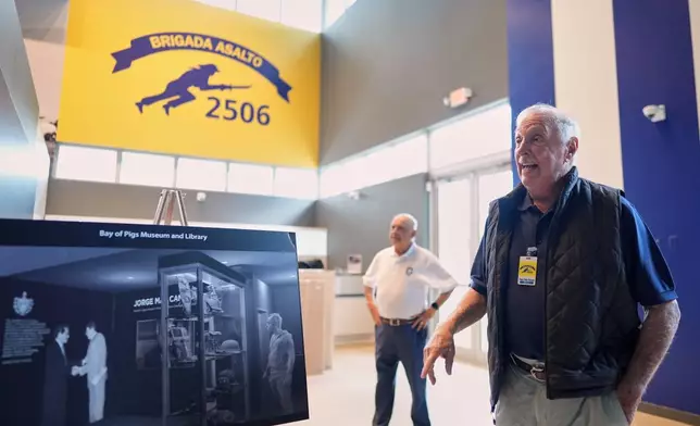 Bay of Pigs Invasion veterans Manuel Portuondo, right, and Ernesto Freyre participate in preparations for the reopening of the Bay of Pigs Museum in its new and larger space in Miami’s Little Havana neighborhood, Friday, March 20, 2026. (AP Photo/Rebecca Blackwell)