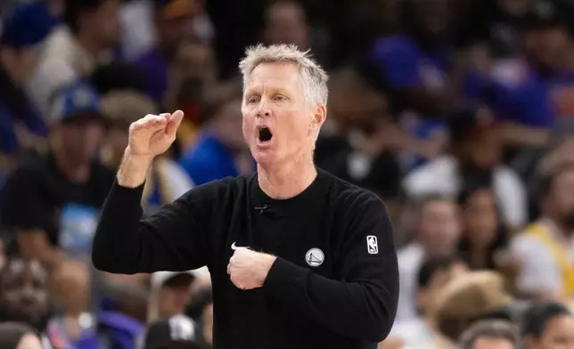 Golden State Warriors Head Coach Steve Kerr is seen during the first half of his NBA play-in tournament game against the Phoenix Suns in Phoenix, Ariz., Friday, April 17, 2026. (Stephen Lam/San Francisco Chronicle via AP)