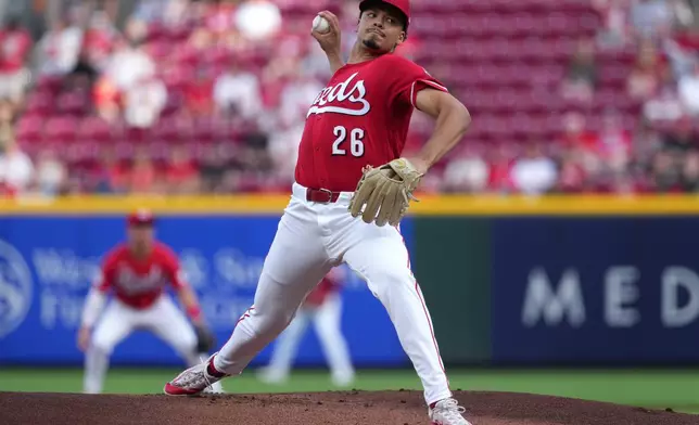 Cincinnati Reds' Chase Burns delivers a pitch during the first inning of a baseball game against the Colorado Rockies', Tuesday, April 28, 2026, in Cincinnati. (AP Photo/Kareem Elgazzar)