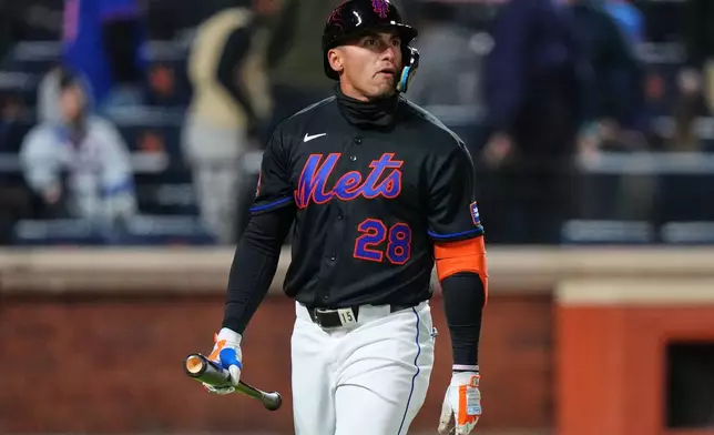 New York Mets' Tyrone Taylor (28) reacts after striking out to end a baseball game against the Minnesota Twins Tuesday, April 21, 2026, in New York. (AP Photo/Frank Franklin II)
