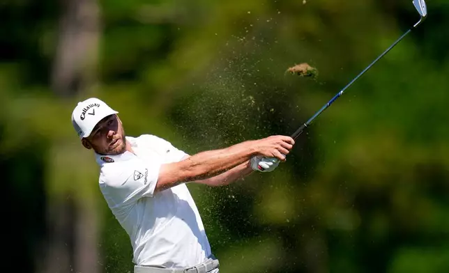 Sam Burns watches his tee shot on the 12th hole during the second round of the Masters golf tournament at the Augusta National Golf Club, Friday, April 10, 2026, in Augusta, Ga. (AP Photo/Eric Gay)