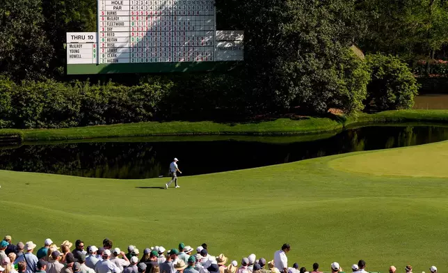 Rory McIlroy, of Northern Ireland, walks to green on the 11th hole during the second round of the Masters golf tournament at the Augusta National Golf Club, Friday, April 10, 2026, in Augusta, Ga. (AP Photo/David J. Phillip)