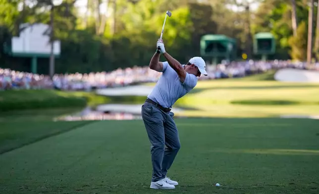 Rory McIlroy, of Northern Ireland, hits his tee shot on the 16th hole during the second round of the Masters golf tournament at the Augusta National Golf Club, Friday, April 10, 2026, in Augusta, Ga. (AP Photo/David J. Phillip)