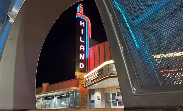 The neon sign in front of the historic Hiland Theatre glows along an urban stretch of Route 66 in Albuquerque, New Mexico, on Thursday, Jan. 22, 2026. (AP Photo/Susan Montoya Bryan)
