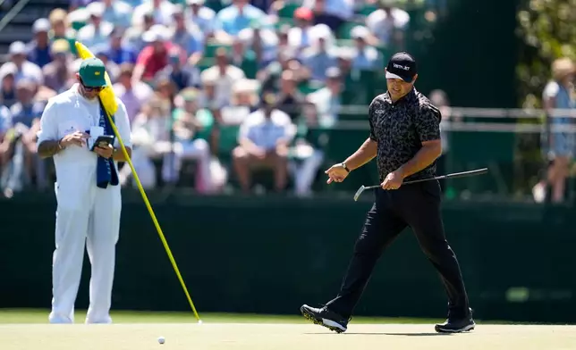 Patrick Reed reacts after missing a putt on the 15th hole during the first round of the Masters golf tournament at the Augusta National Golf Club, Thursday, April 9, 2026, in Augusta, Ga. (AP Photo/Ashley Landis)