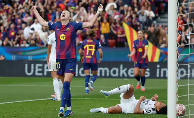 Barcelona's Graham Hansen celebrates after scoring her side's second goal during a Champions League quarterfinal soccer match between Barcelona and Real Madrid, in Barcelona, Spain, Thursday, April 2 2026. (AP Photo/Joan Monfort)