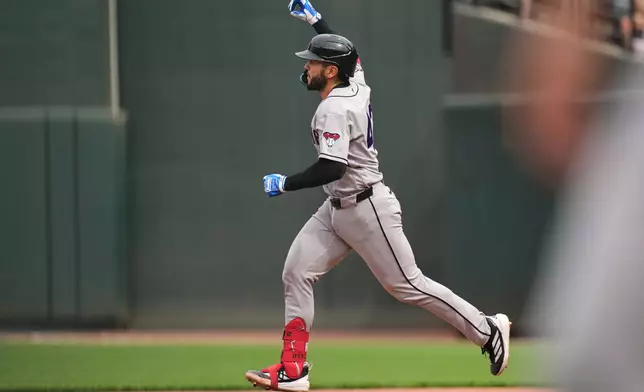 Arizona Diamondbacks' Adrian del Castillo rounds the bases after hitting a two-run home run during the 10th inning of a baseball game against the Baltimore Orioles, Wednesday, April 15, 2026, in Baltimore. (AP Photo/Stephanie Scarbrough)