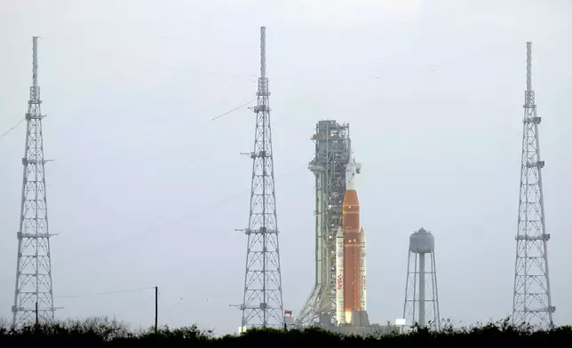 NASA's Artermis II moon rocket sits on Launch Pad 39-B at the Kennedy Space Center hours ahead of a planned launch attempt Wednesday, April 1, 2026, in Cape Canaveral, Fla. (AP Photo/Chris O'Meara)