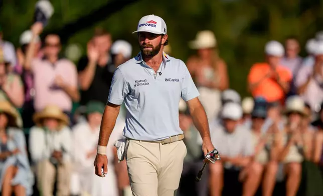Cameron Young walks off the green after his third round at the Masters golf tournament at the Augusta National Golf Club, Saturday, April 11, 2026, in Augusta, Ga. (AP Photo/Matt Slocum)
