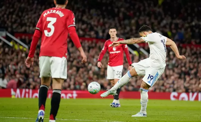 Leeds' Noah Okafor scores during the Premiier League soccer match between Manchester United and Leeds in Manchester, England, Monday, April 13, 2026. (AP Photo/Dave Thompson)