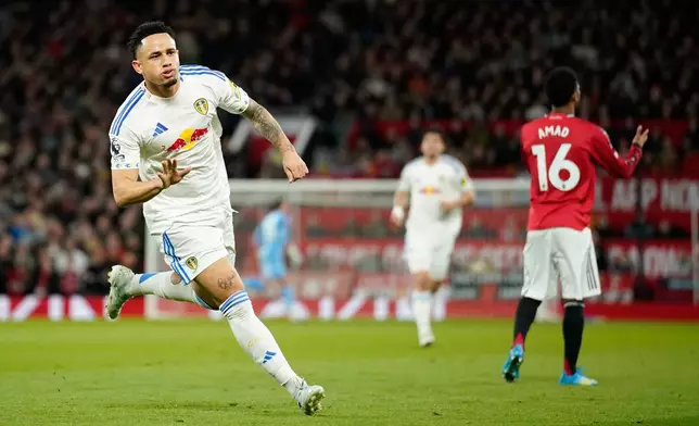 Leeds' Noah Okafor celebrates after scoring during the Premiier League soccer match between Manchester United and Leeds in Manchester, England, Monday, April 13, 2026. (AP Photo/Dave Thompson)