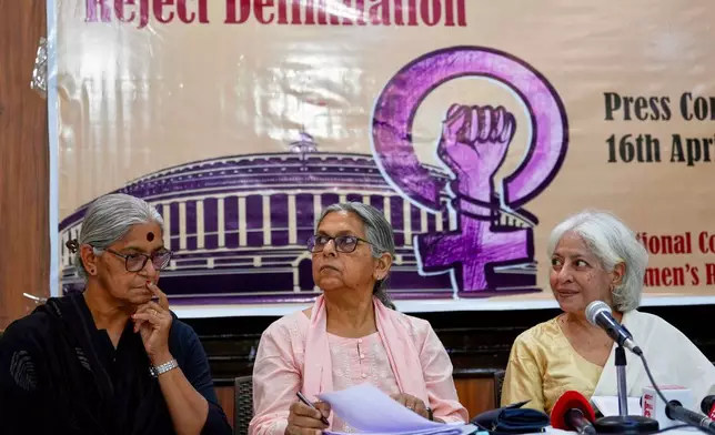 Communist Party of India member Annie Raja, left, activist Padma Singh, center, and writer Radha Kumar address a press conference after sending a petition on women's reservation to the parliamentarians in New Delhi, India, Thursday, April 16, 2026. (AP Photo/Manish Swarup)