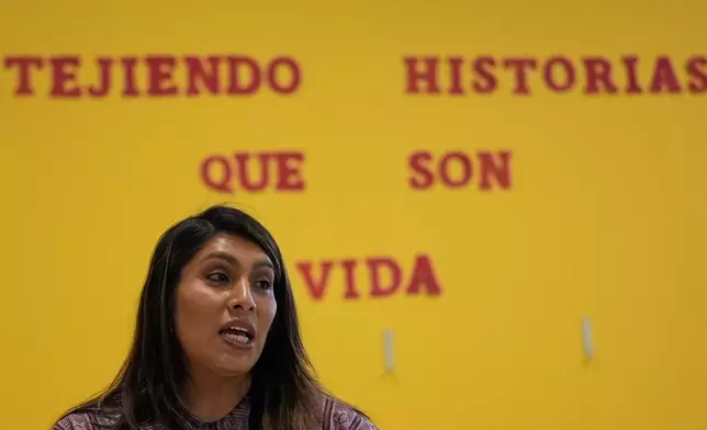 Muxe artist Xaneri Merino gives a backstrap loom workshop for LGBTQ+ people in Mexico City, Tuesday, April 14, 2026. (AP Photo/Marco Ugarte)