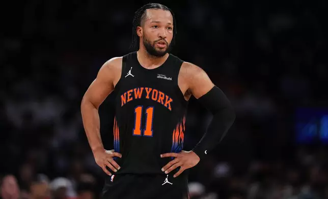 New York Knicks' Jalen Brunson (11) talks to a teammate during the first half in Game 5 of a first-round NBA playoffs basketball series against the Atlanta Hawks, Tuesday, April 28, 2026, in New York. (AP Photo/Frank Franklin II)