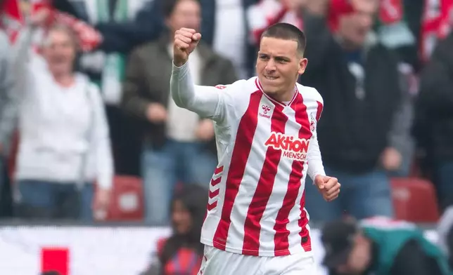 Koln's Said El Mala celebrates after scoring the opening goal during German Bundesliga soccer match between 1. FC Koln and Werder Bremen and Werder Bremen, in Cologne, Germany, Sunday, April 12, 2026. (Marius Becker/dpa via AP)