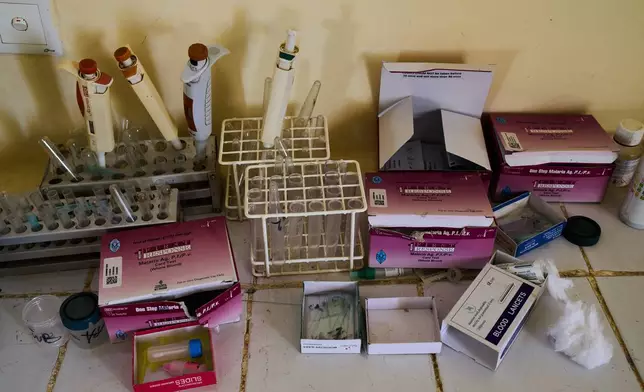 Lab utensils sit at a public health clinic in Qoz Nafisa village, Khartoum state, Sudan, Wednesday, April 22, 2026. (AP Photo/Bernat Armangue)