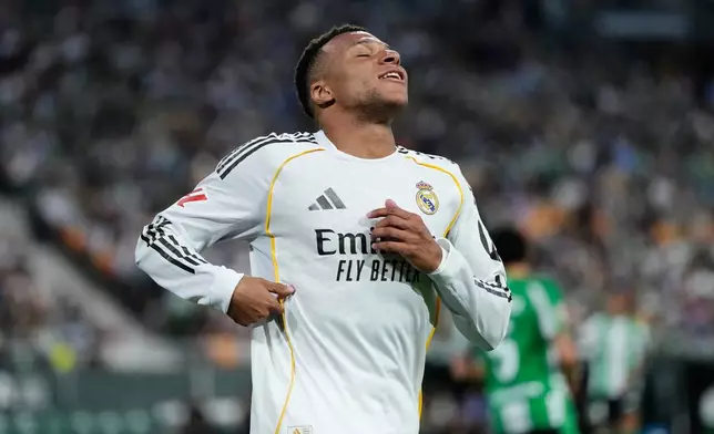 Real Madrid's Kylian Mbappe reacts during a La Liga soccer match between Real Betis and Real Madrid in Seville, Spain, Friday, April 24, 2026. (AP Photo/Jose Breton)