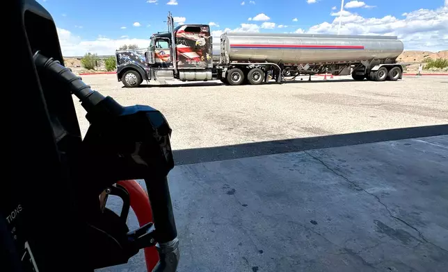 A tanker truck delivers more fuel to a tribally owned gas station along Interstate 25 near San Felipe Pueblo, New Mexico, on Thursday, April 9, 2026. (AP Photo/Susan Montoya Bryan)