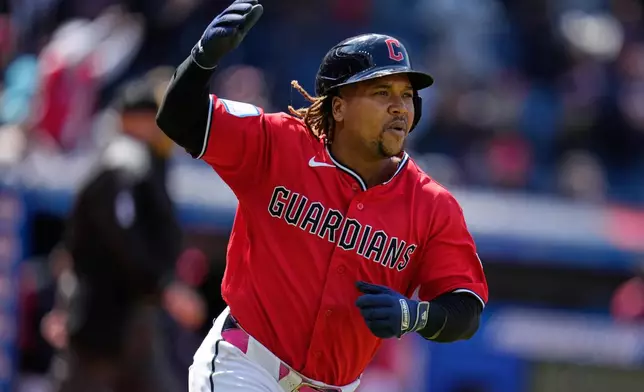Cleveland Guardians' José Ramírez celebrates as he runs the bases with a solo home run in the fifth inning of a baseball game against the Baltimore Orioles in Cleveland, Sunday, April 19, 2026. (AP Photo/Sue Ogrocki)