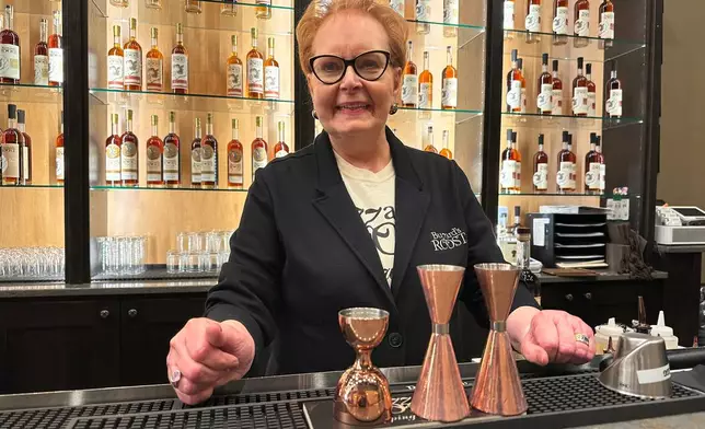 Judy Hollis Jones, CEO of Buzzard's Roost, stands for a portrait in the bourbon company's bar area in Louisville, Ky., Thursday, April 2, 2026. (AP Photo/Dylan Lovan)