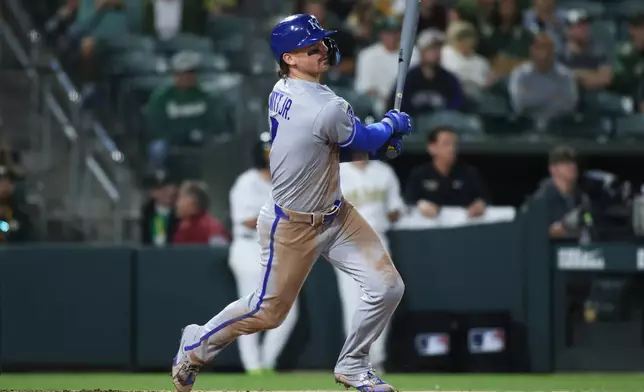 Kansas City Royals' Bobby Witt Jr. hits a three run home run during the 10th inning of a baseball game against the Athletics, Tuesday, April 28, 2026, in West Sacramento, Calif. (AP Photo/Scott Marshall)