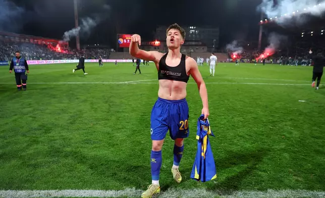 Bosnia's Esmir Bajraktarevic celebrates after winning a penalty shootout during the World Cup qualifying playoff final soccer match between Bosnia and Italy in Zenica, Bosnia, Tuesday, March 31, 2026. (AP Photo/Armin Durgut)