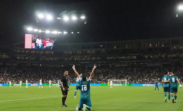 Iraq's Aymen Hussein celebrates scoring his side's 2nd goal during the World Cup playoff final soccer match between Iraq and Bolivia in Monterrey, Mexico, Tuesday, March 31, 2026. (AP Photo/Fernando Llano)