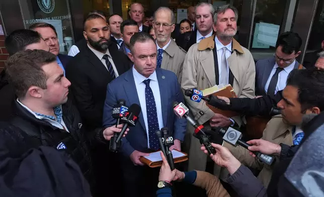Brian Williams, President of the State Police Association of Massachusetts, addresses reporters outside Worcester County Superior Court following the arraignment of three State Police officers, Thursday, April 2, 2026, in Worcester, Mass. (AP Photo/Charles Krupa)