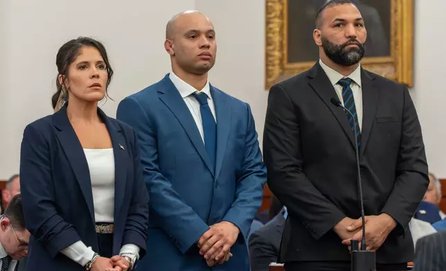 Massachusetts State Police Lt. Jennifer Penton, from left, and troopers David Montanez and Edwin Rodriguez, are arraigned on charges of involuntary manslaughter in the death of Enrique Delgado-Garcia, in Worcester Superior Court, Thursday, April 2, 2026, in Worcester, Mass. (Rick Cinclair/Worcester Telegram &amp; Gazette via AP, Pool)