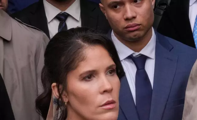 Mass State Police Lt. Jennifer Penton, front, Trooper David Montanez, middle, and Trooper Edwin Rodriguez, rear, stand outside Worcester County Superior Court after pleading not guilty to charges of involuntary manslaughter, Thursday, April 2, 2026, in Worcester, Mass. (AP Photo/Charles Krupa)