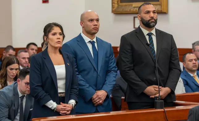 Lt. Jennifer Penton and from left, troopers David Montanez and Edwin Rodriguez are arraigned in Worcester Superior Court on Thursday, April 2, 2026 in Worcester, Mass. (Rick Cinclair/Worcester Telegram &amp; Gazette via AP, Pool)
