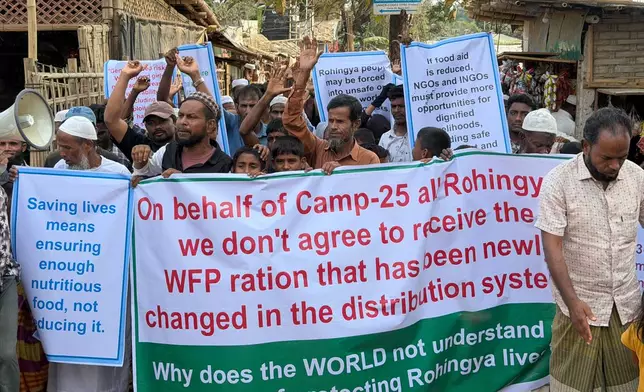 Rohingya refugees struggling to survive in Bangladesh’s overcrowded camps, protest after their food assistance was slashed, in Cox's Bazar, Bangladesh, Wednesday, April 1, 2026. (AP Photo)