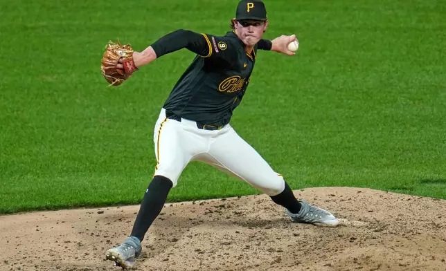Pittsburgh Pirates pitcher Hunter Barco delivers during the seventh inning of a baseball game against the St. Louis Cardinals in Pittsburgh, Thursday, April 28, 2026. (AP Photo/Gene J. Puskar)