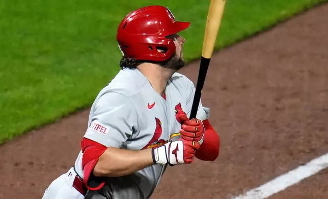 St. Louis Cardinals' Alec Burleson doubles off Pittsburgh Pirates pitcher Hunter Barco, driving in two runs during the eighth inning of a baseball game in Pittsburgh, Thursday, April 28, 2026. (AP Photo/Gene J. Puskar)