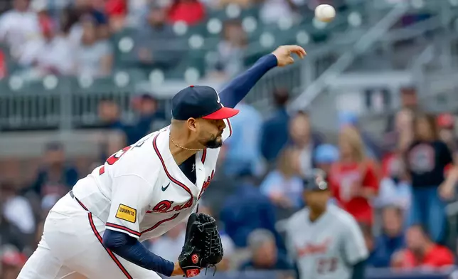 Atlanta Braves pitcher Martin Perez (33) delivers to a Detroit Tigers batter during the first inning of a baseball game against the Detroit Tigers, Tuesday, April 28, 2026, in Atlanta. (AP Photo/Erik S. Lesser)