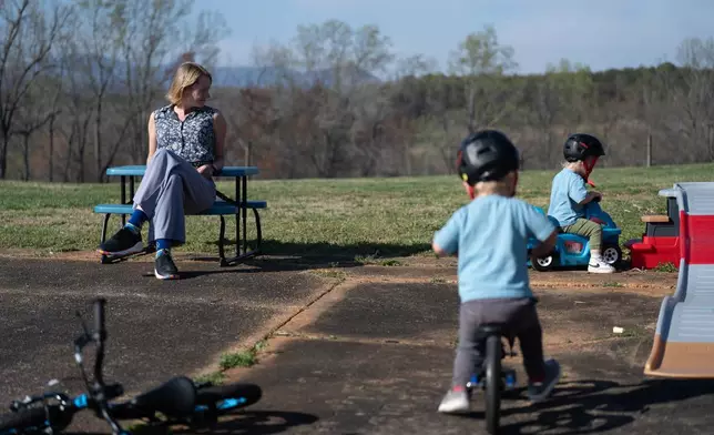 Helen Kaiser watches her sons play at their home in Landrum, S.C., on March 19, 2026. (AP Photo/Mary Conlon)