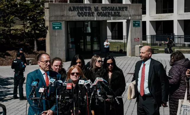 Asa Ellerup, wife, of Rex Heuermann gives her statement outside the courthouse as Rex Heuermann, accused in Long Island's infamous Gilgo Beach serial killings, pleaded guilty on Wednesday, April 8, 2026, at Suffolk County Court in Riverhead, New York. (AP Photo/Eduardo Munoz Alvarez)