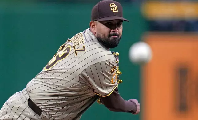 San Diego Padres pitcher Germán Márquez delivers during the first inning of a baseball game against the Pittsburgh Pirates in Pittsburgh, Monday, April 6, 2026. (AP Photo/Gene J. Puskar)